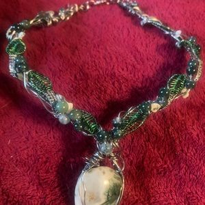 Silver wire wrapped moss agate